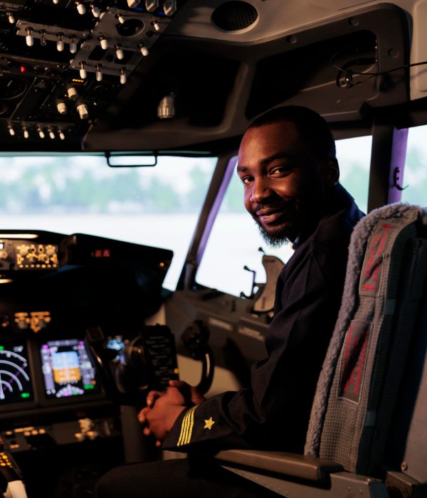 portrait-male-aviator-sitting-airplane-cockpit-ready-fly-using-control-panel-navigation-dashboard-command-buttons-pilot-flying-aircraft-with-windscreen-compass-radar